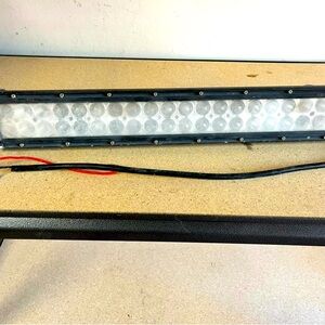 Rectangular LED light bar with wiring.